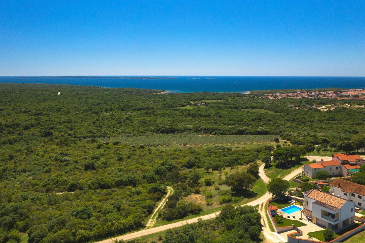 Villa White Barbariga Bagian luar foto