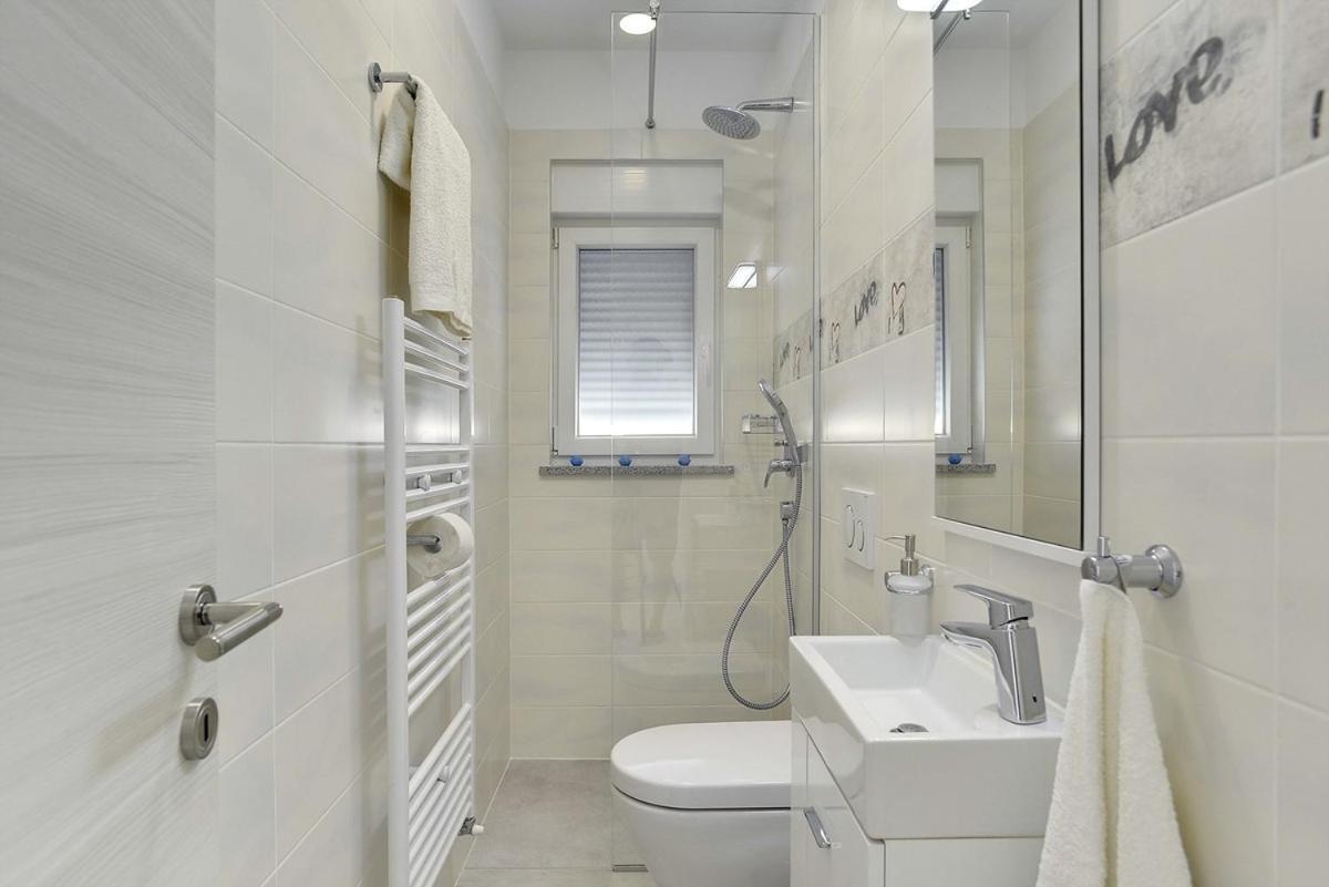 Villa White Barbariga Bagian luar foto